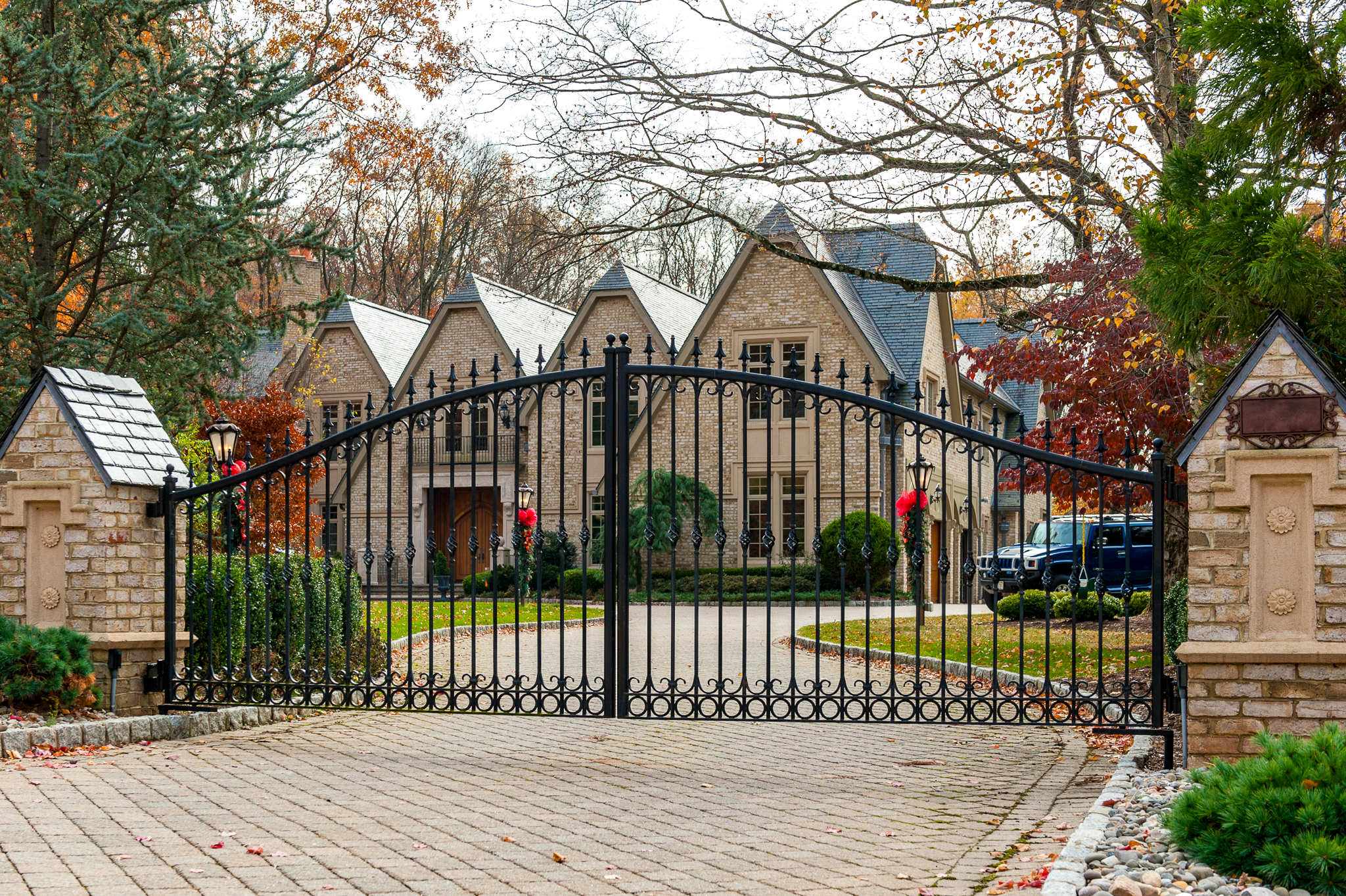 Iron metal gate in front of a house