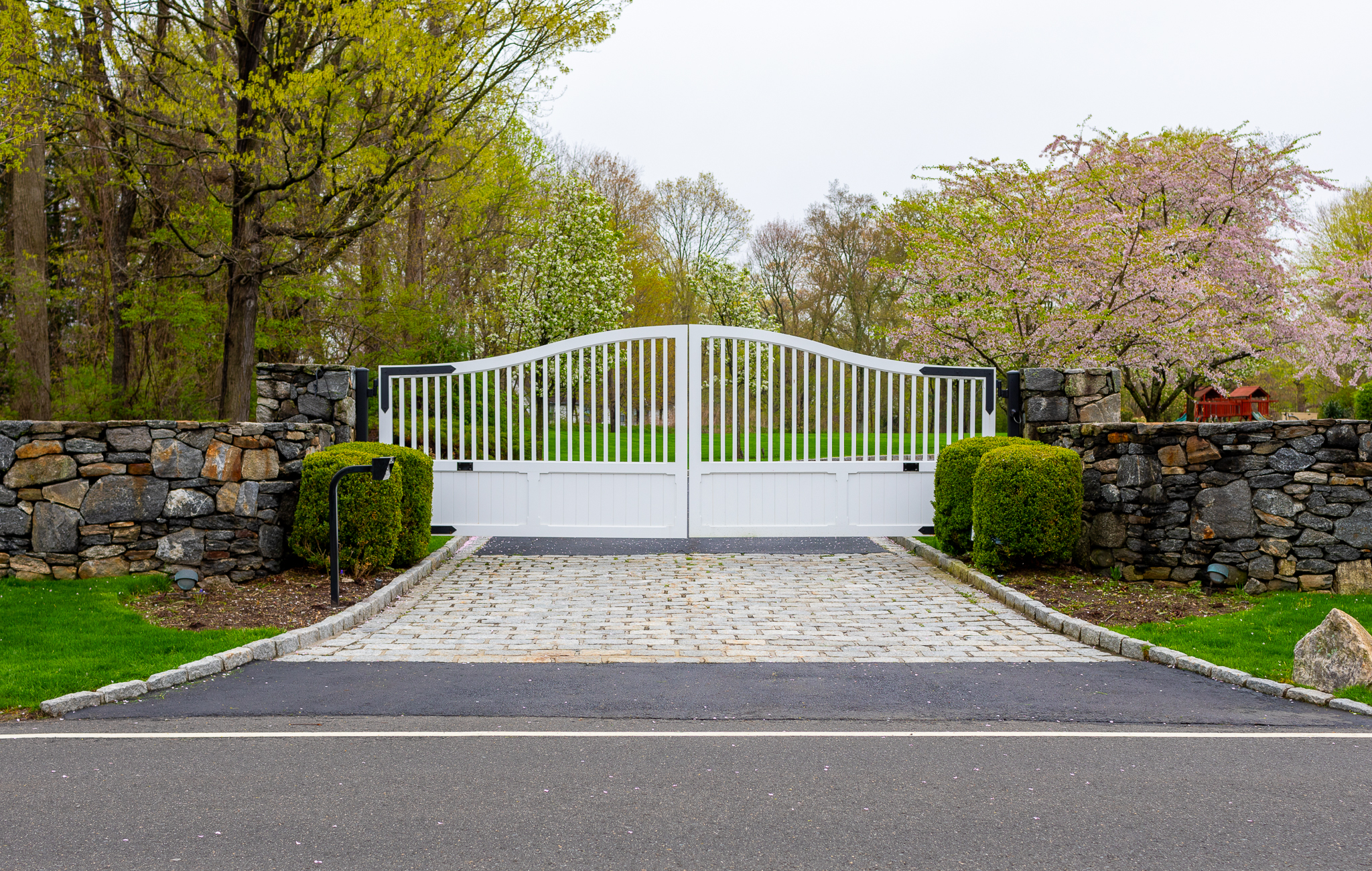 Traditional style white composite gate