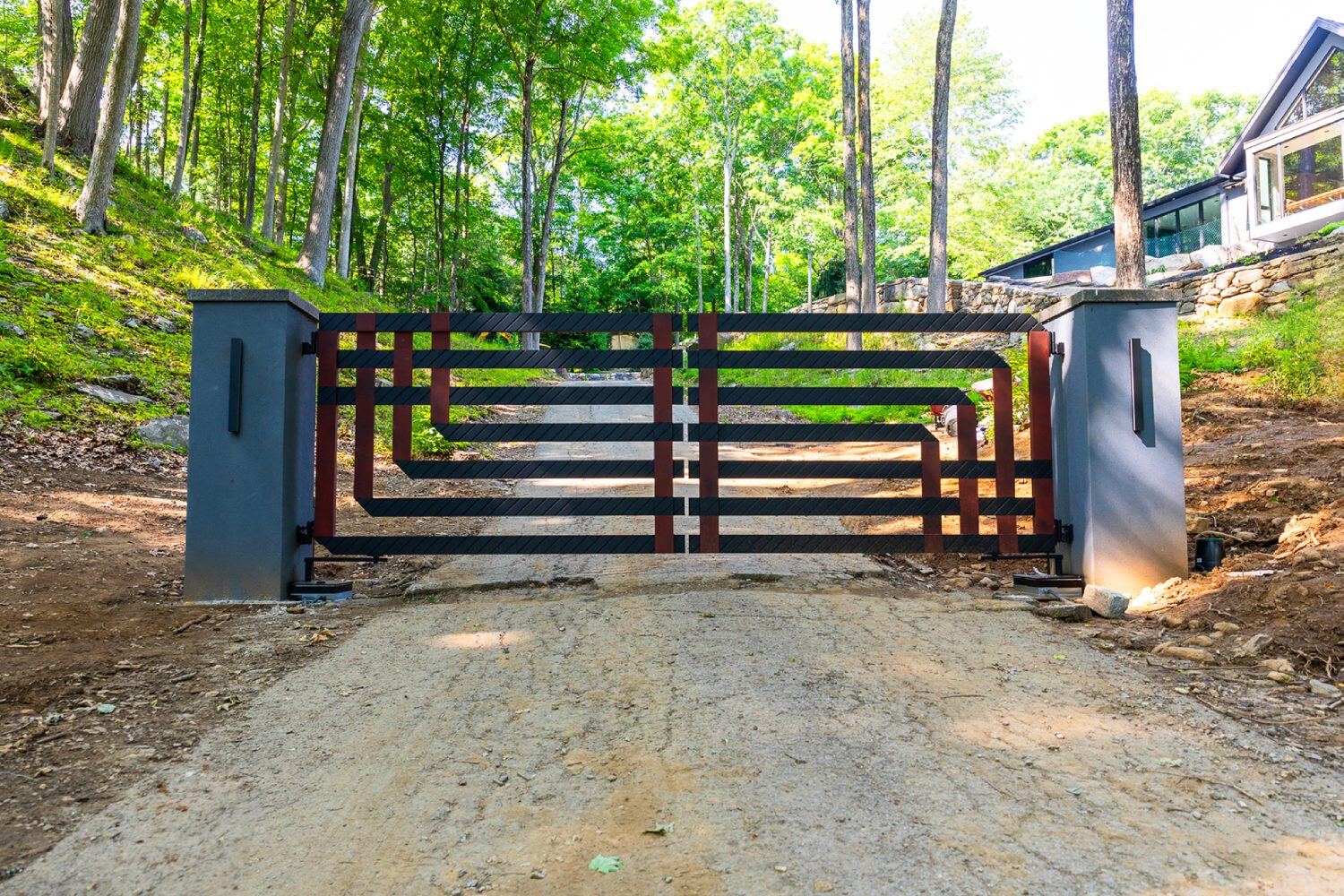 After installation of a metal driveway gate