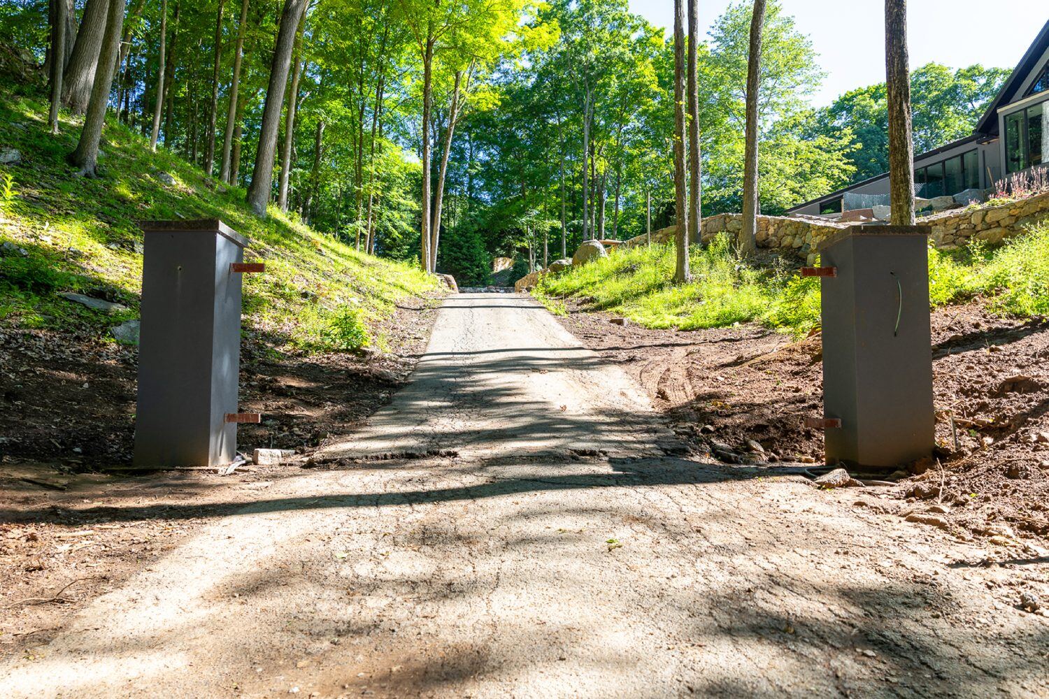 Before installation of a metal driveway gate