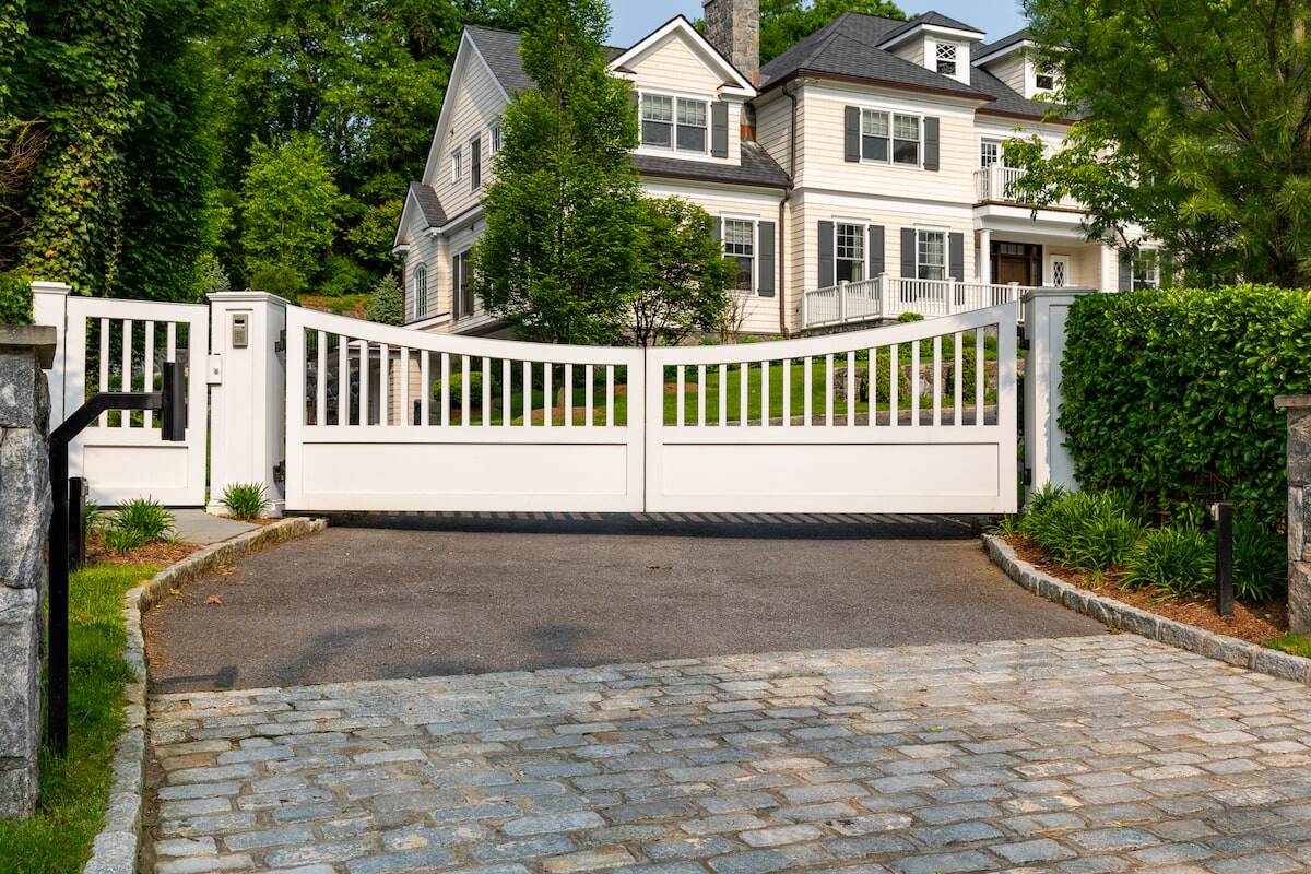 Modern white wood driveway gate