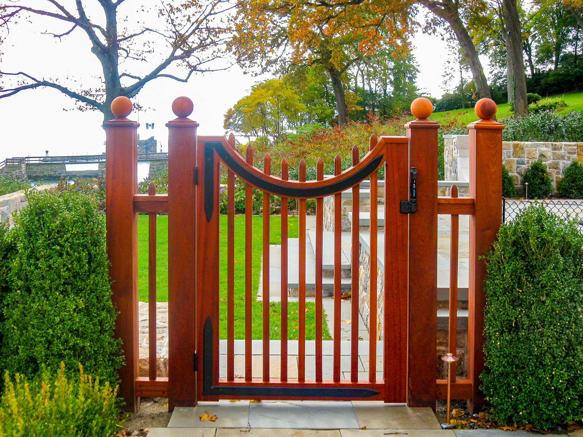 Curved wood walk gate