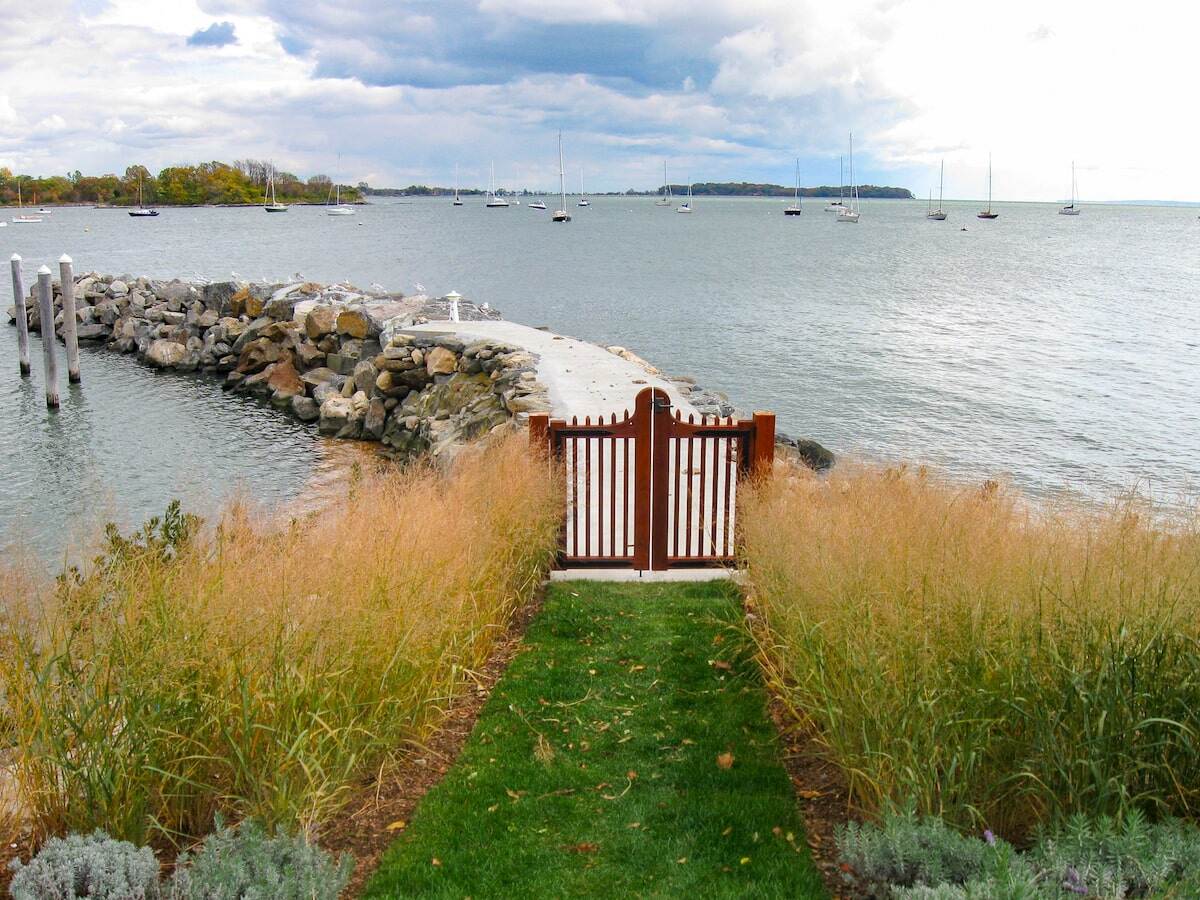 Wood walk gate by the water
